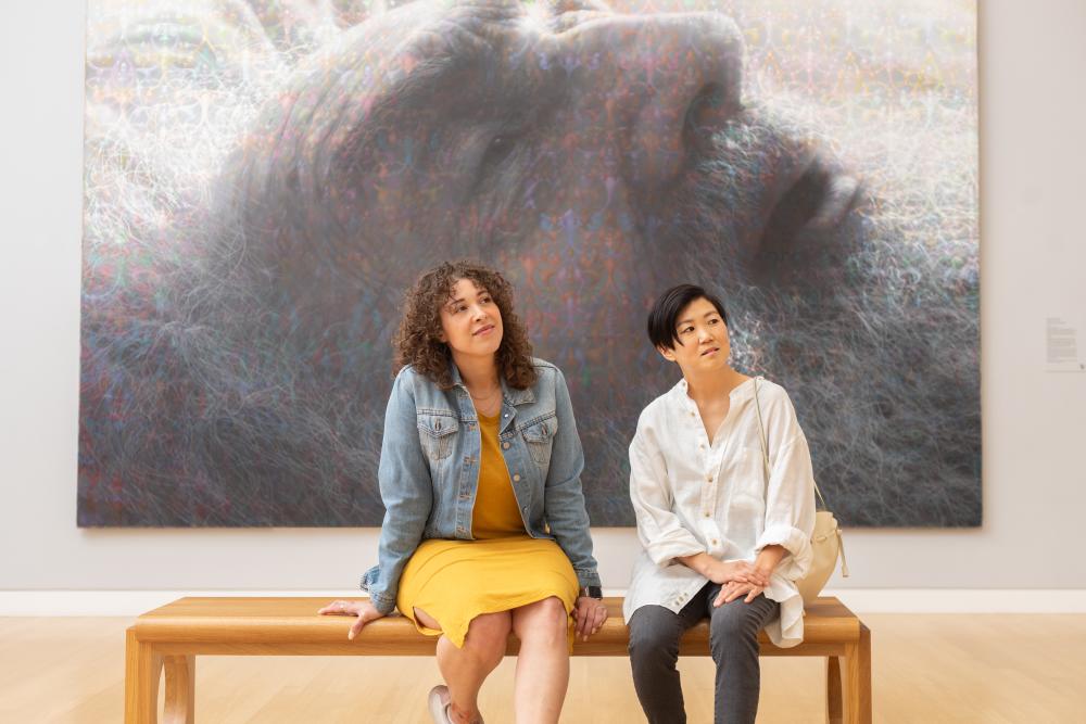 Two women looking at the artwork at the Crocker Art Museum