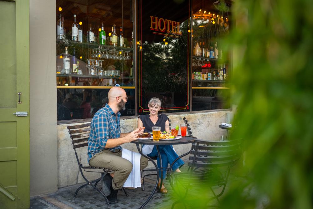 Dining on the Cup Cafe Patio at Hotel Congress