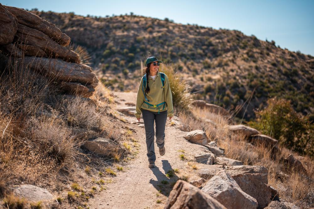 woman hiking on a desert trail on Mount Lemmon