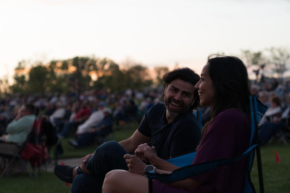 Couple Enjoying an Outdoor Concert