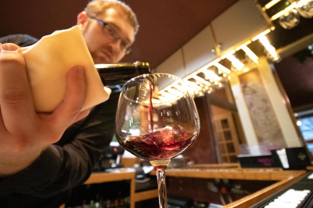 Pouring Wine at Cafe Bel Ami