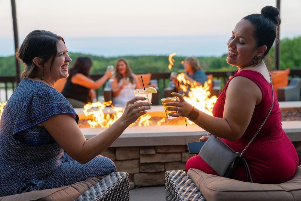 Ladies having a drink fireside at the Grand Geneva
