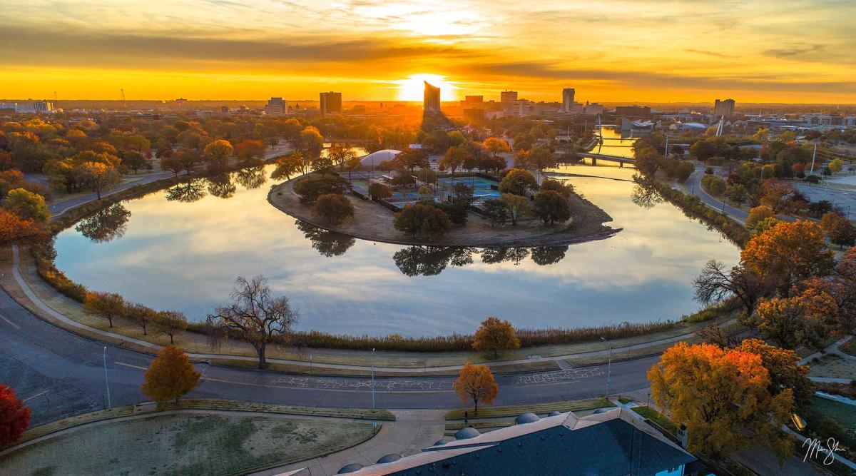 A photo is taken at sunset of the river bend near Wichita Art Museum by Mickey Shannon