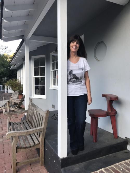 Lynell Seabold standing on Ava Gardner's former porch in Nichols Canyon.