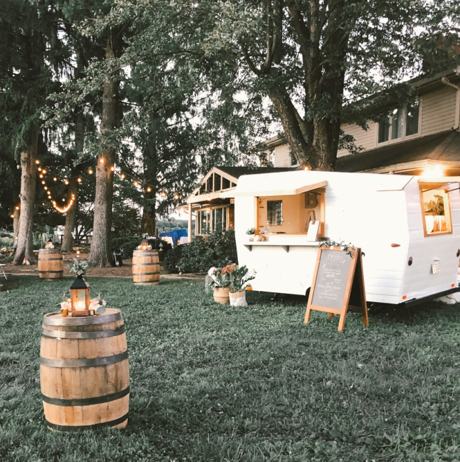 A backyard is party ready with a Vintage Views mobile bar set-up