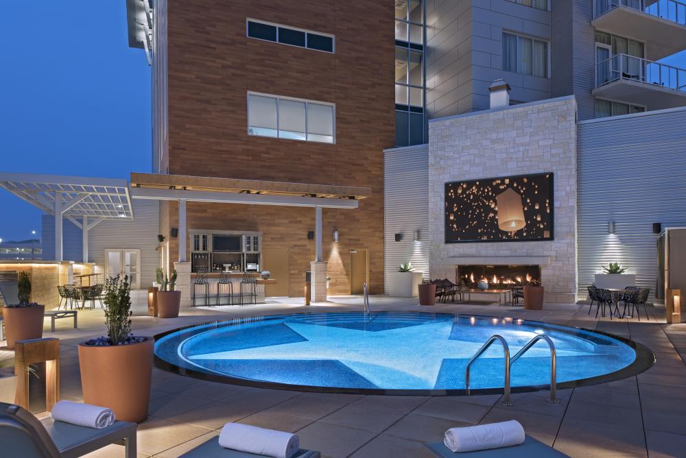 Archer Hotel Austin Pool Patio with TV on