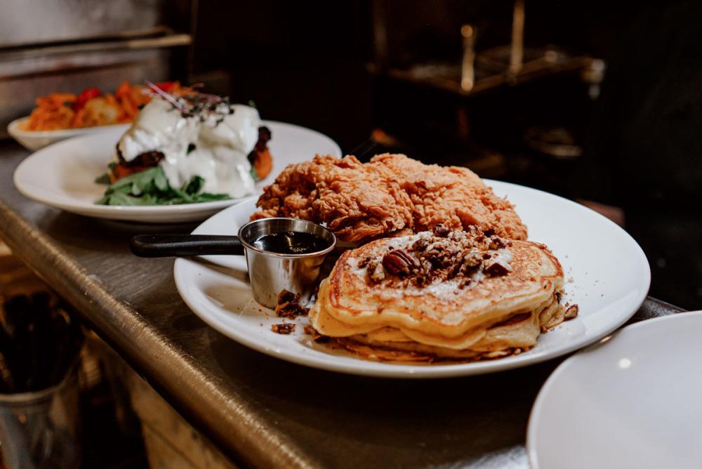Plates of brunch food ready to serve at Ophelia's in Fort Wayne, Indiana