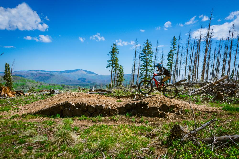 A mountain biker speeds along a trail on Pajarito Mountain in Los Alamos, New Mexico.