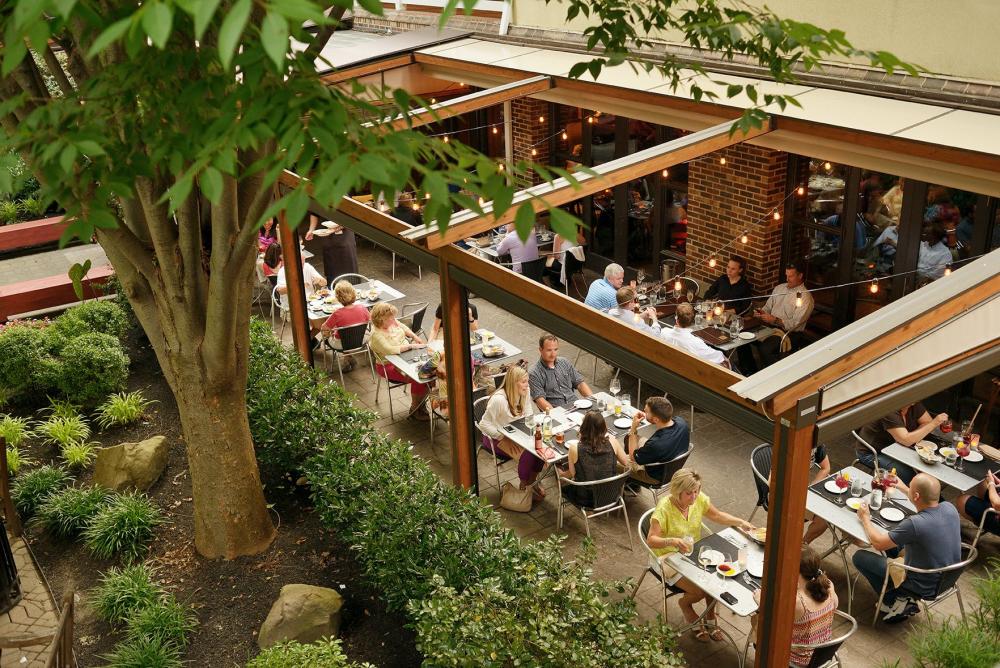 Mediterra's outdoor dining area filled with patrons