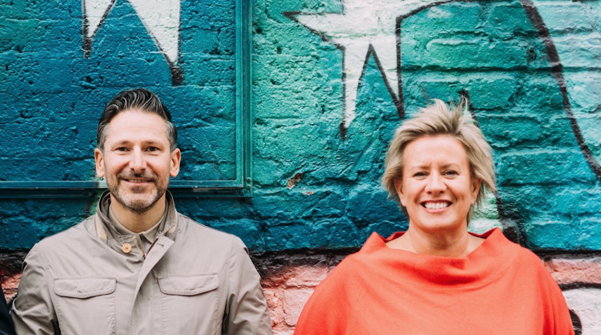Brendan McGurgan and Claire Colvin sitting beside eachother with a blue background