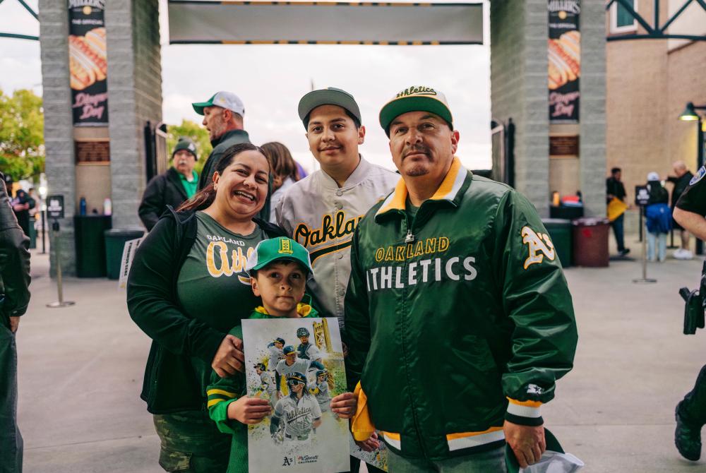 Family of four at an Athletics game in Sacramento