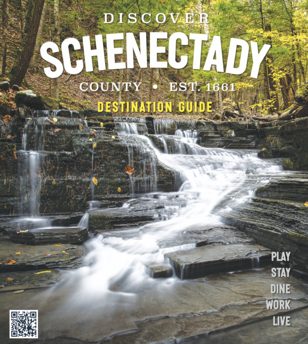 Cover of the 25-26 Schenectady County Destination Guide. Waterfall in the fall.