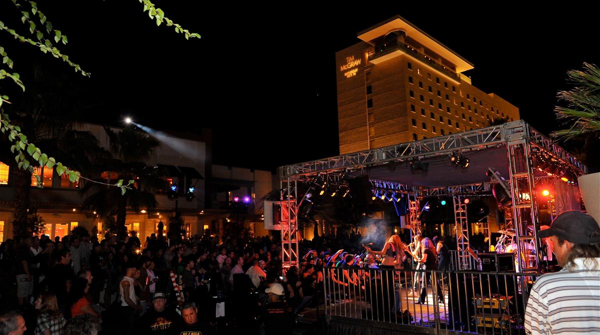 A crowd watches a cover band at The Rock Yard at Fantasy Springs Resort Casino