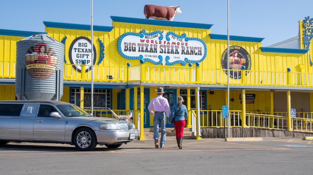 A couple walking in to Big Texan in Amarillo, Texas