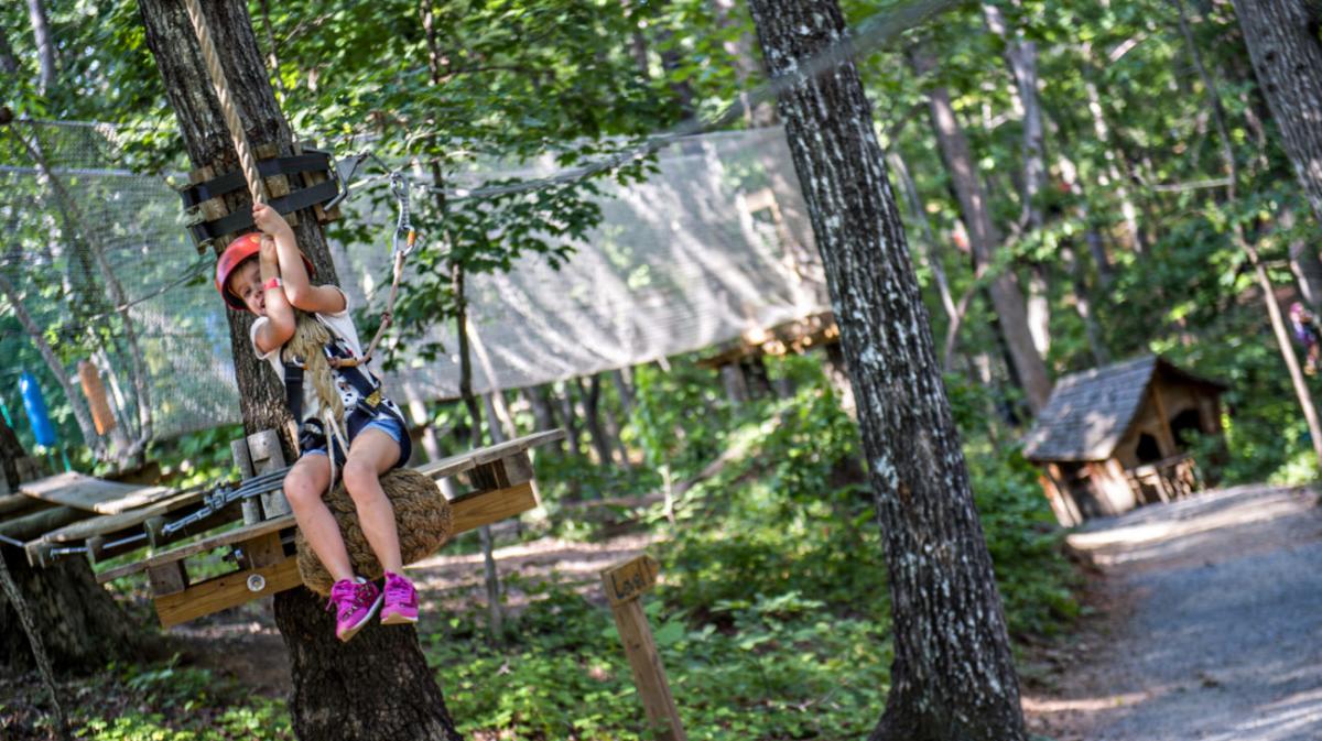 girl on rope swing