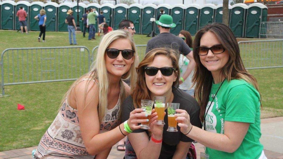 women holding beers