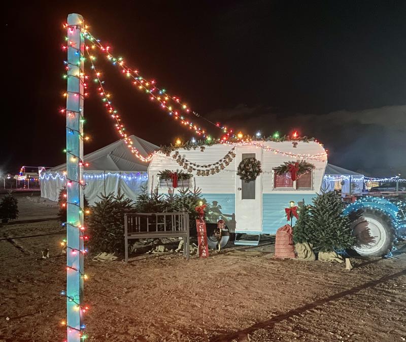 A trailer decorated with Christmas decor at Big Jim Farm's Winter of Enchantment.