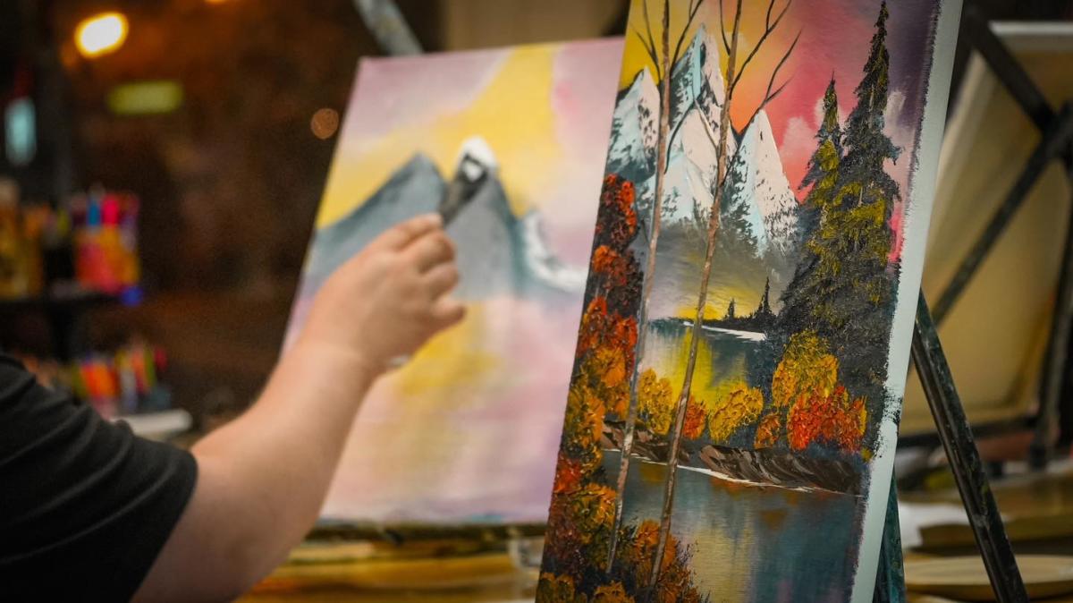 Artist painting at ArtLink studio