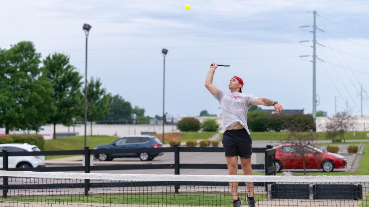 a man playing pickleball at freeman lake