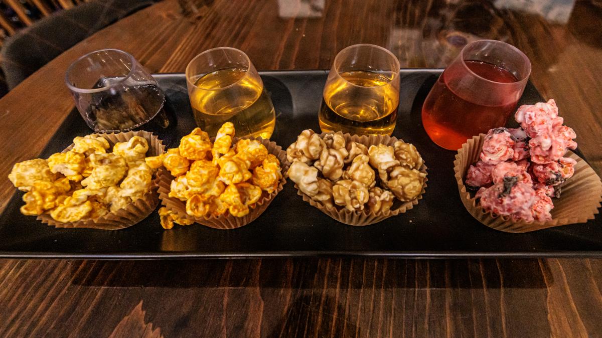 Four varieties of sweet and savory popcorn are paired with four different wines at Sit and Stay Winery during Kalamazoo Craft Beverage Week.
