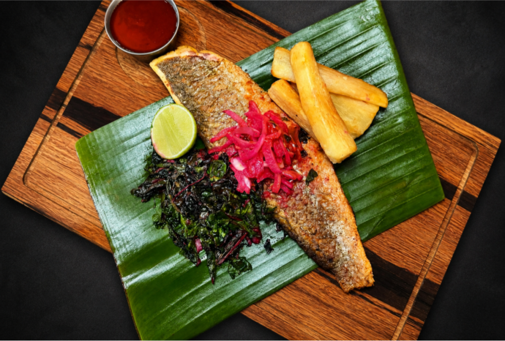 Grilled Red Fish & Yuca Fries with braised collard greens and tamarind chutney