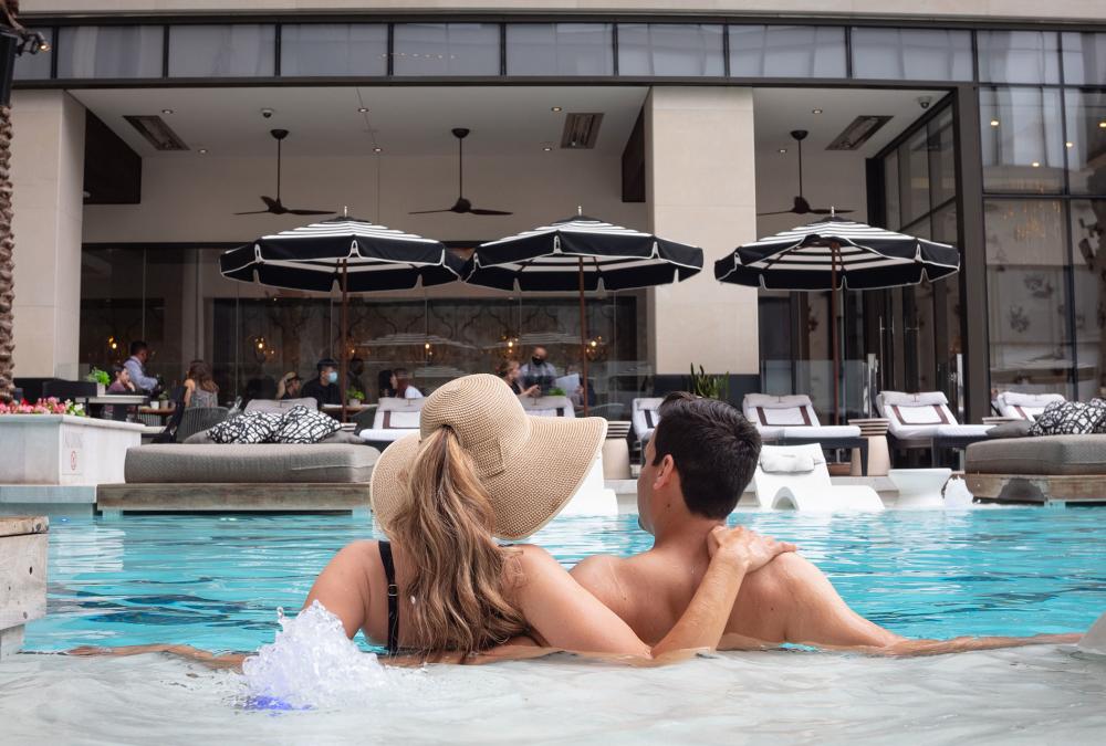 Post Oak Hotel Pool Couple