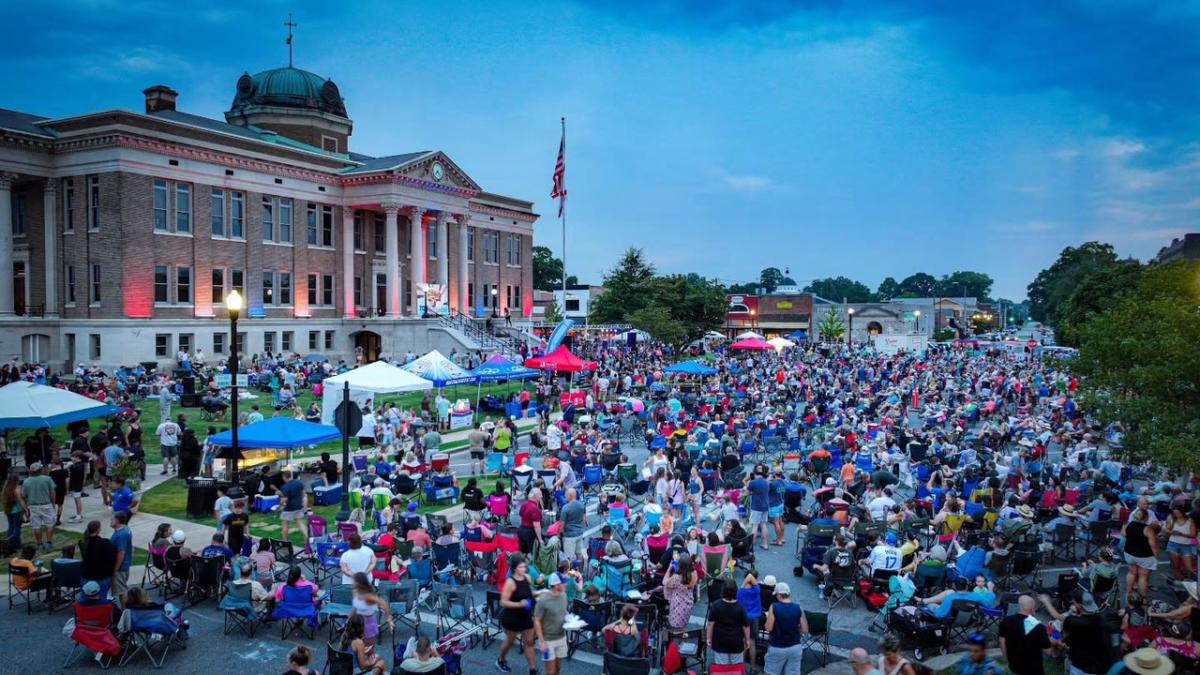 pic of Athens courthouse and a large crowd of people at Athens fridays after five.