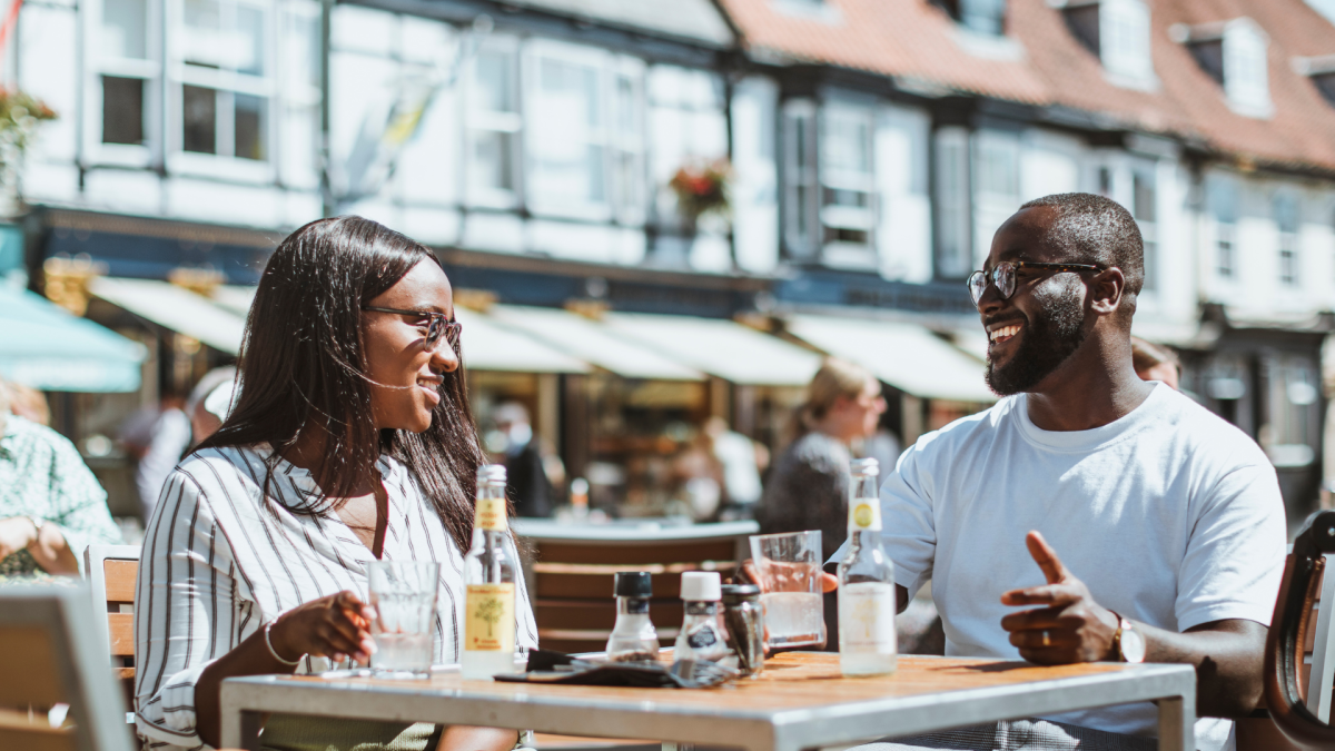 A couple enjoying alfresco dining at Saturday Market, Beverley.