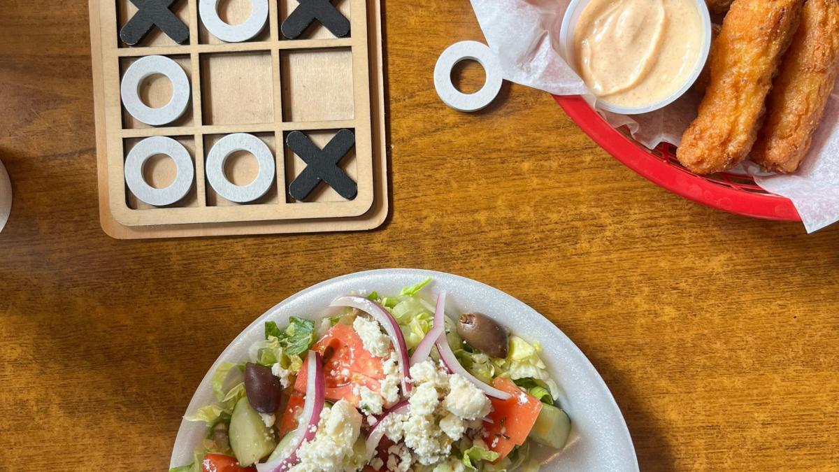 greek salad, a game of checkers, and mozzarella sticks from woohoo