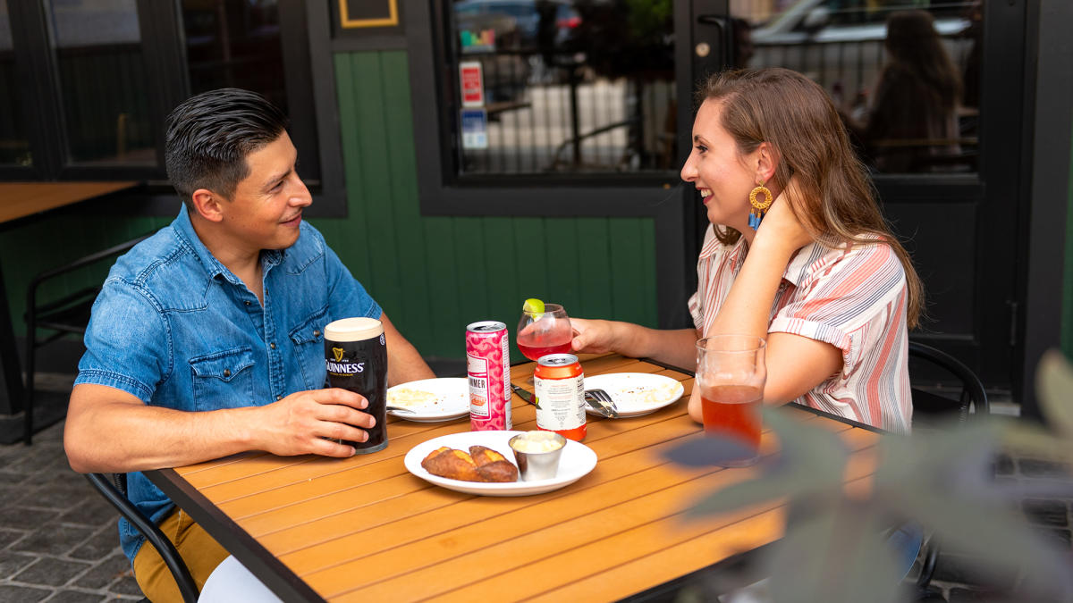 couple eating outside at JK O'Donnell's Irish Pub in Fort Wayne