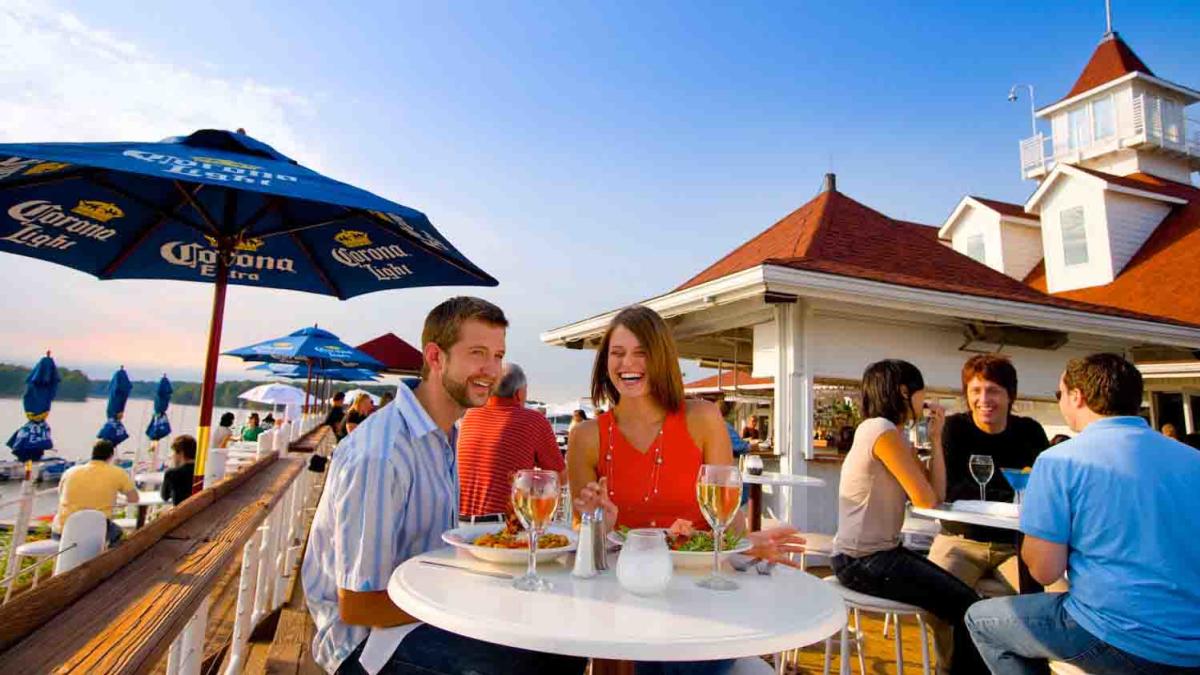 A Happy Couple At The Ricks Cafe Boatyard patio