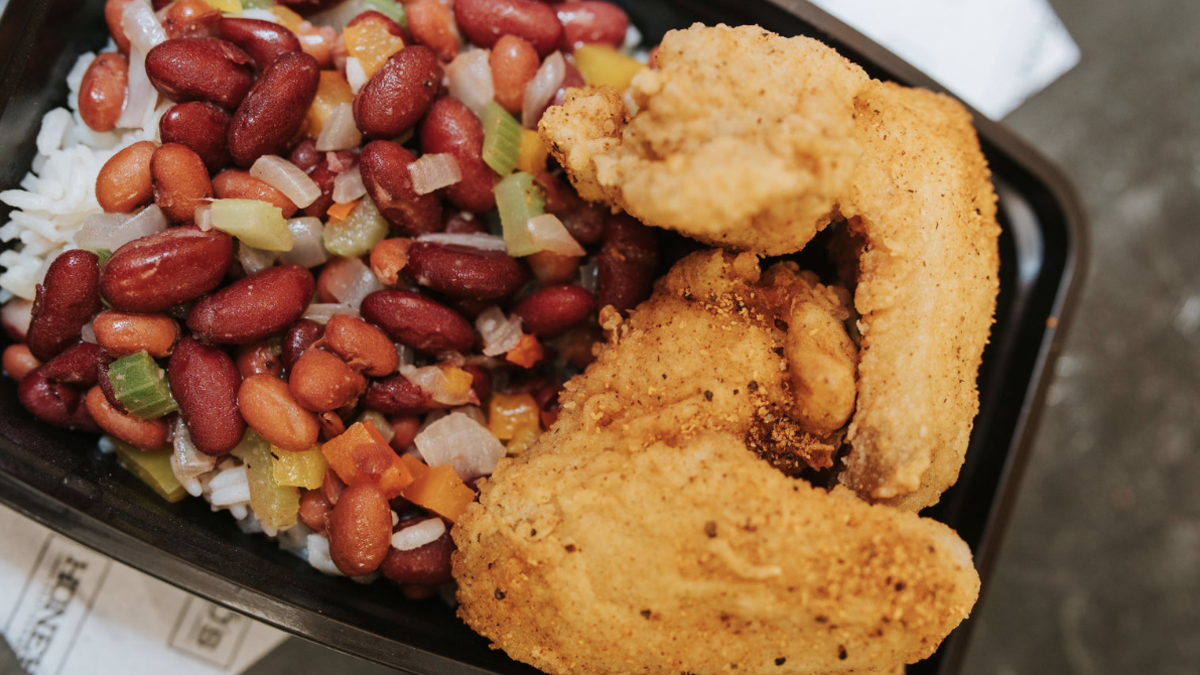 Plate of fried food, beans and rice