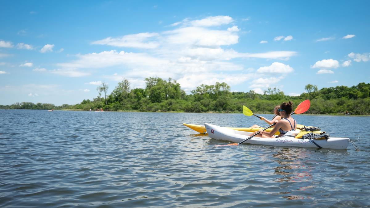 Two women kayaking on Lake Wingra Madison, WI