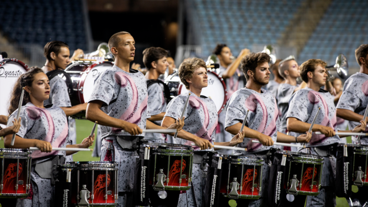 Group of drummers performing on a field