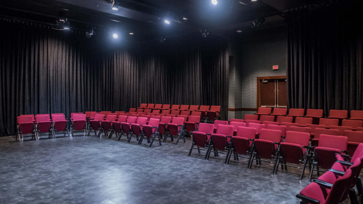 Empty seating area of The ARC Theatre