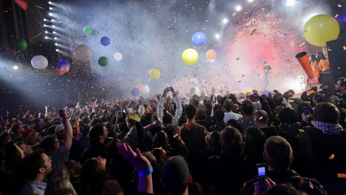 An view from the crowd cheering on a band as they play at the Pabst Theater in Milwaukee.