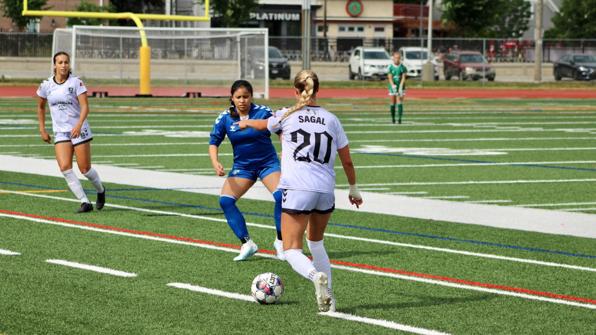 female soccer player with ball