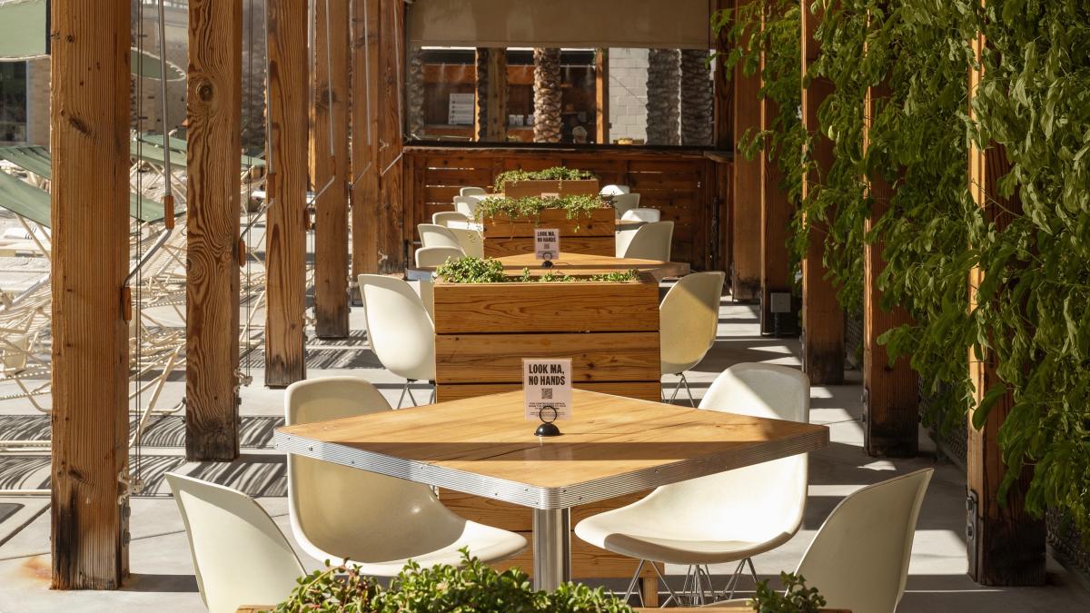 Outdoor dining patio at Ace Hotel & Swim Club