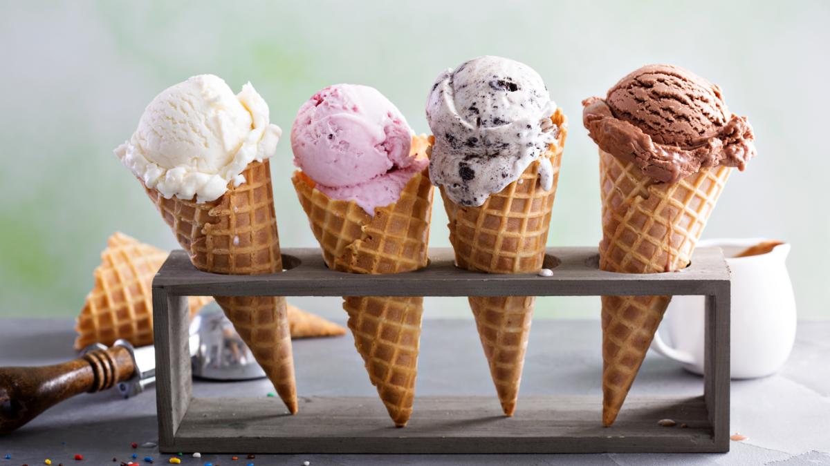 4 ice cream cones in a wooden holder