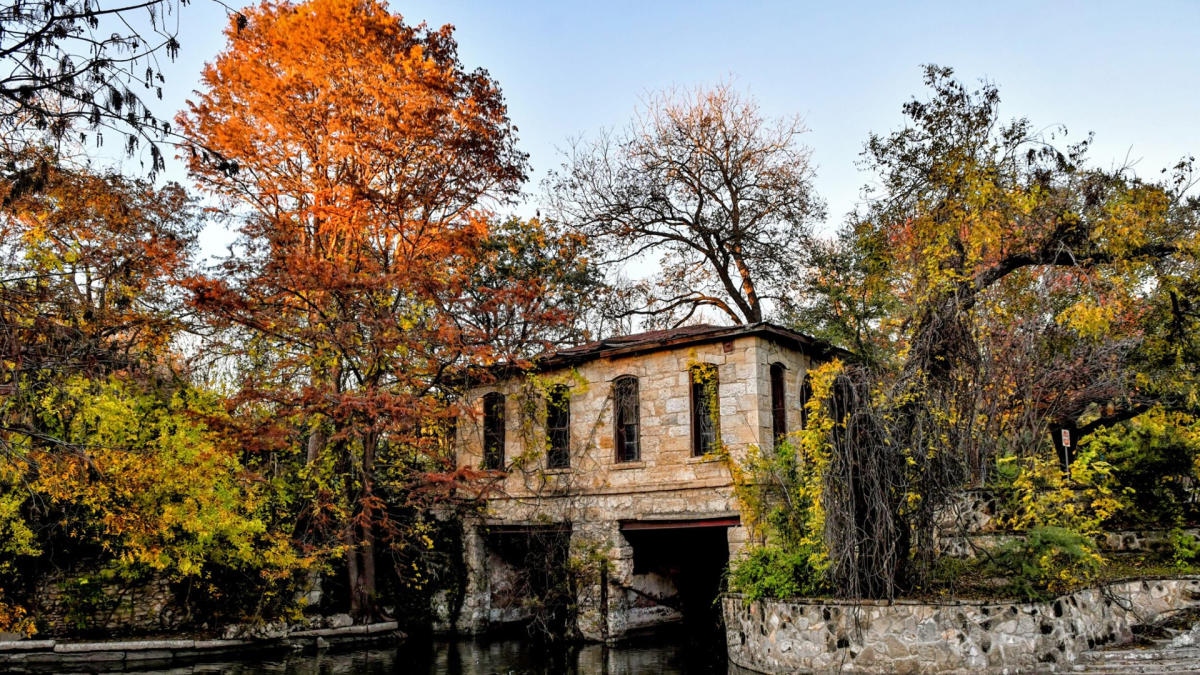 Stone building surrounded by trees