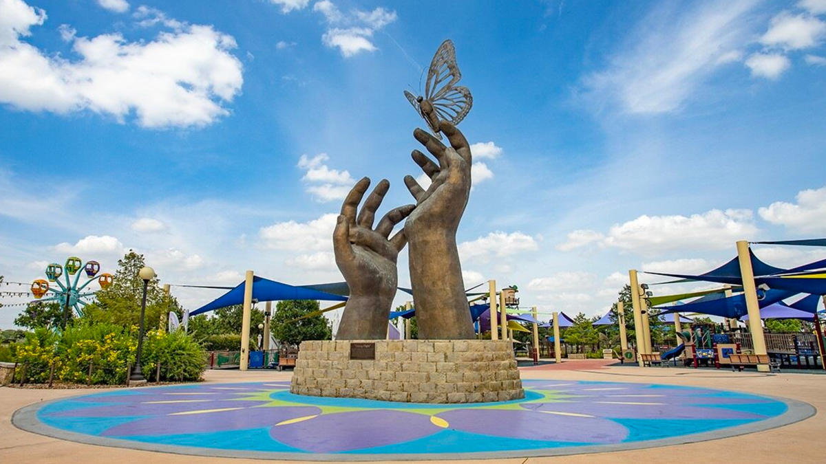 Sculpture of hands with butterfly