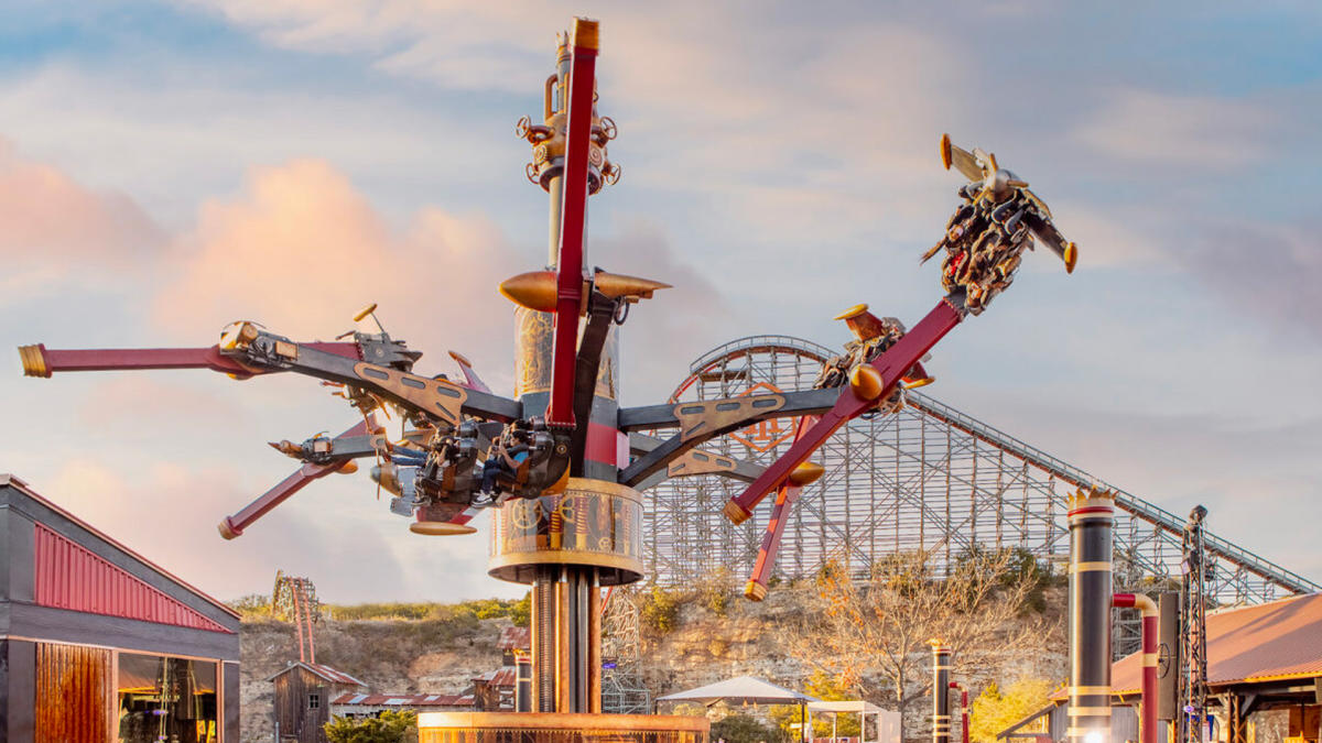 Aerial ride in front of roller coaster