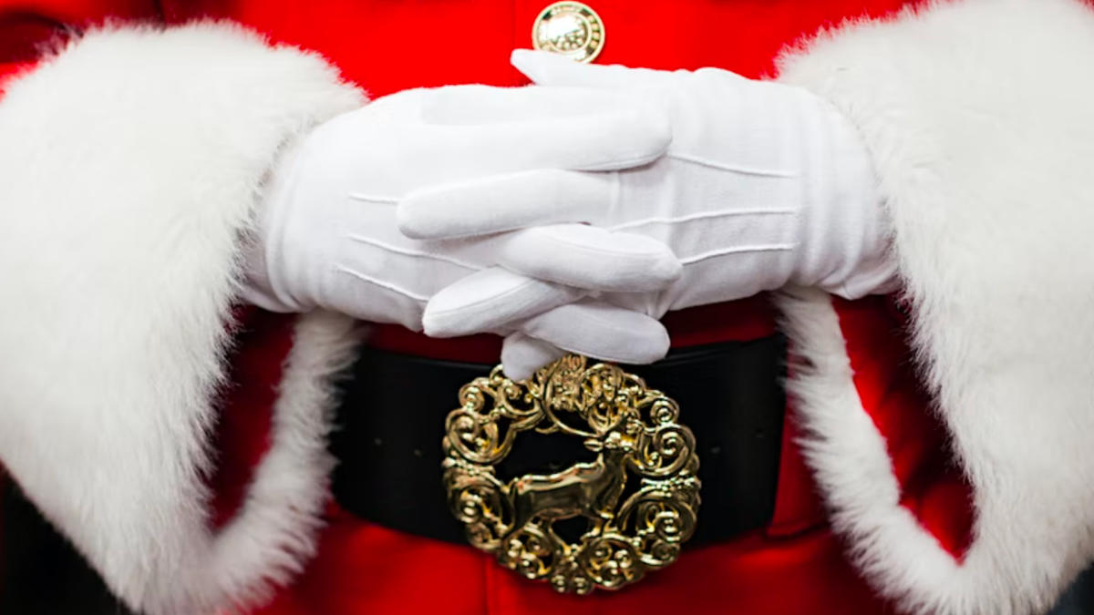 Santa hands over belt