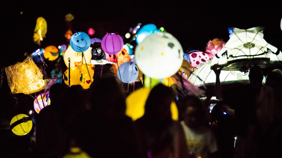 Illuminated lanterns being carried in the Sandy Springs Lantern Parade.