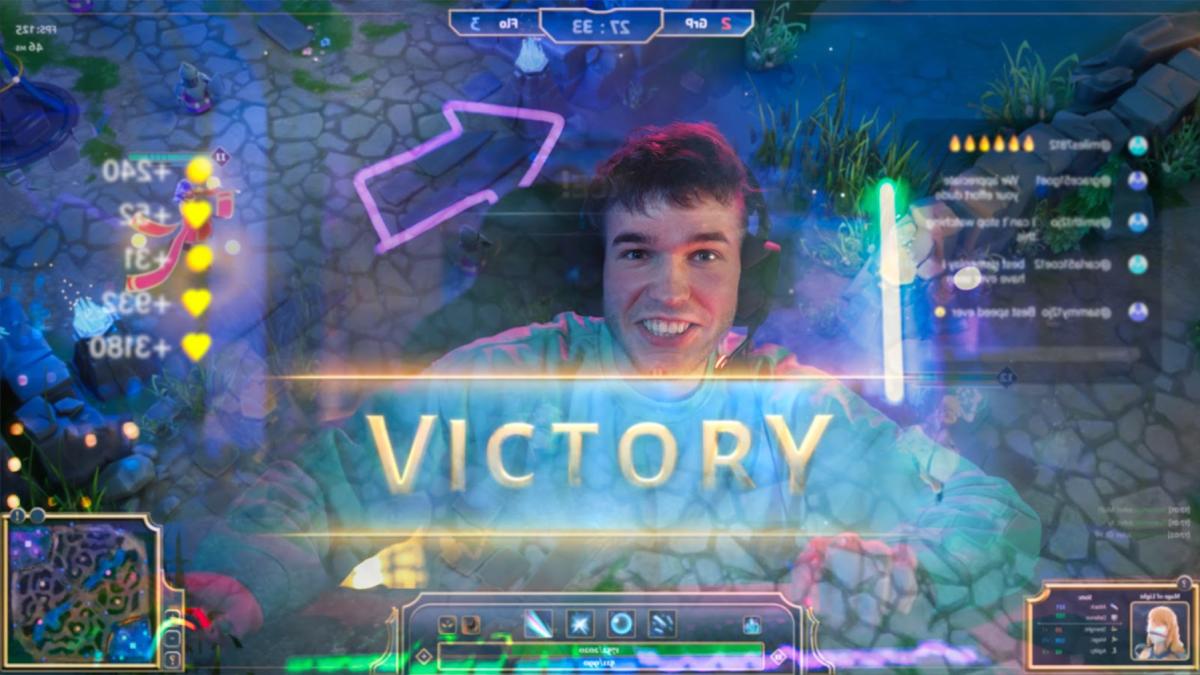 A young man plays video games. "Victory" is visible across the screen.