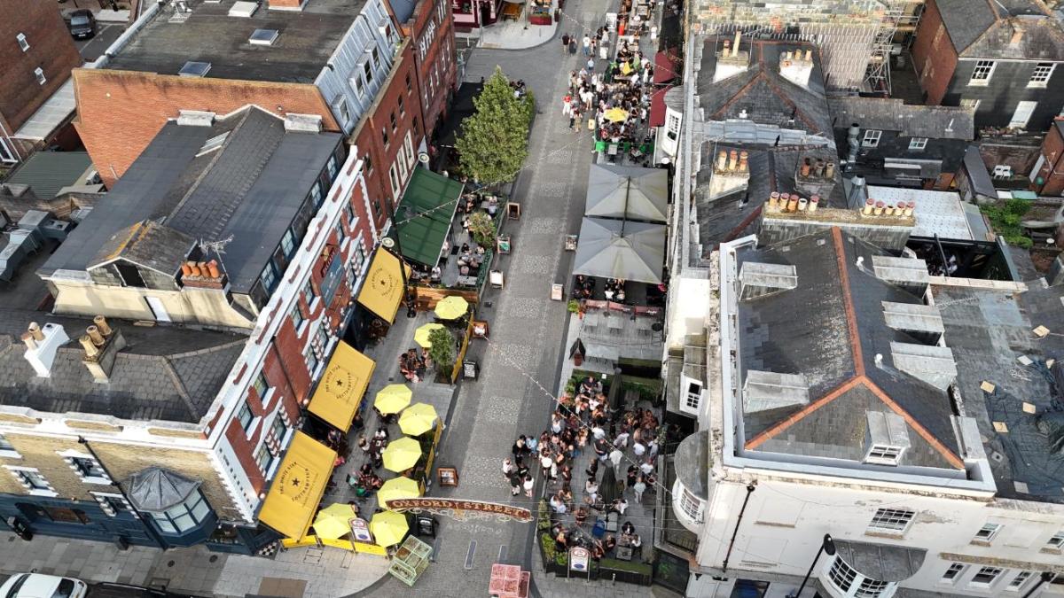 Birds eye view of crowds enjoying al fresco dining on Oxford Street
