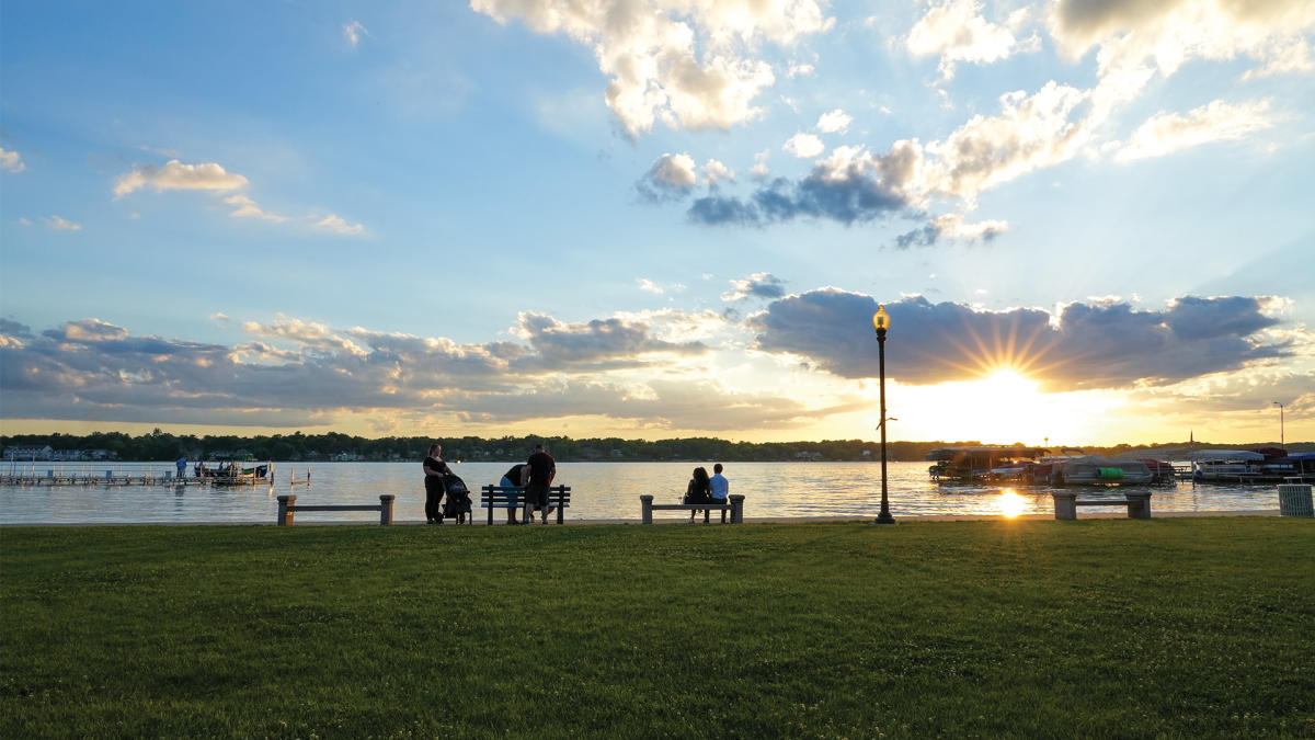 People relaxing on Cedar Lake