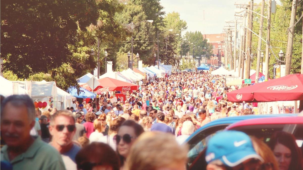 Crowd of people at an outdoor event.