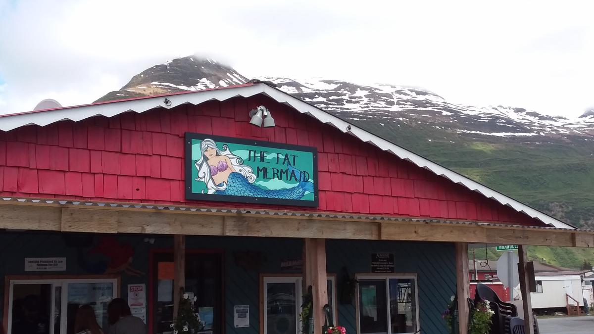 a restaurant; mountains in background