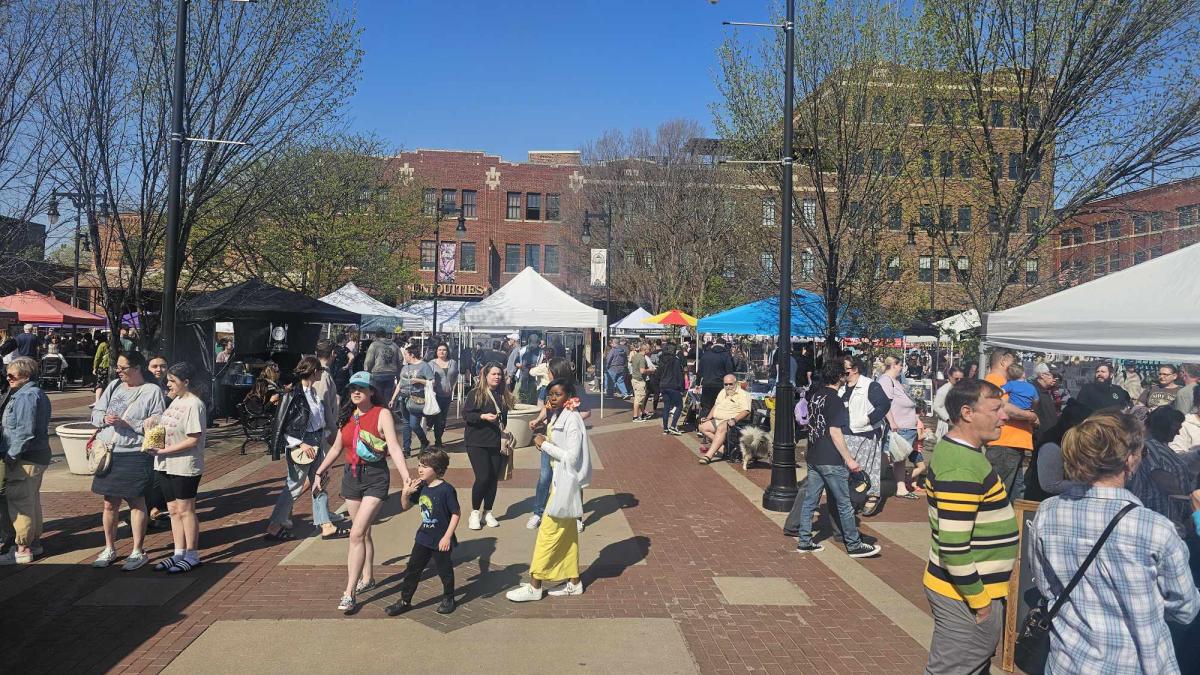 People shop at the Old Town Farm & Art Market in Wichita